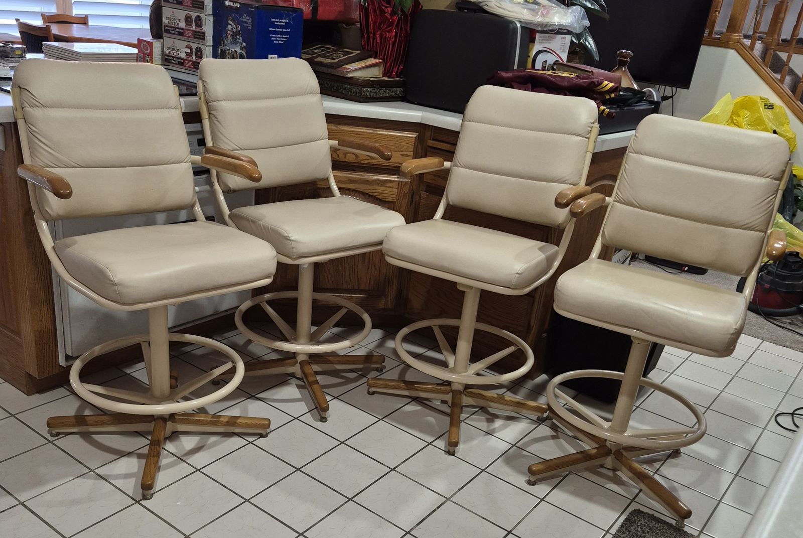 Set of 4 Ivory colored vinyl Bar Stools with wooden accents and footrests
