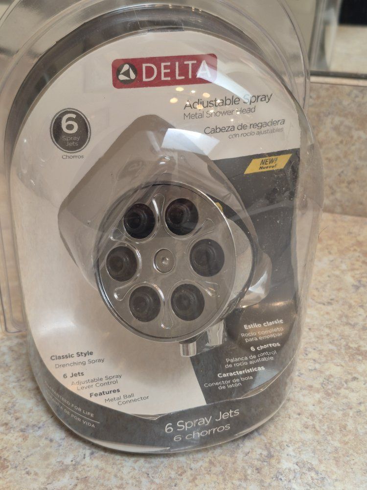 Metal shower head.
