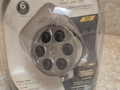 Metal shower head.