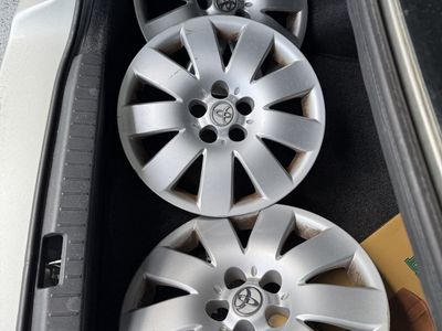 Toyota Corolla 2003 OEM Hubcaps - Set of 3, Silver