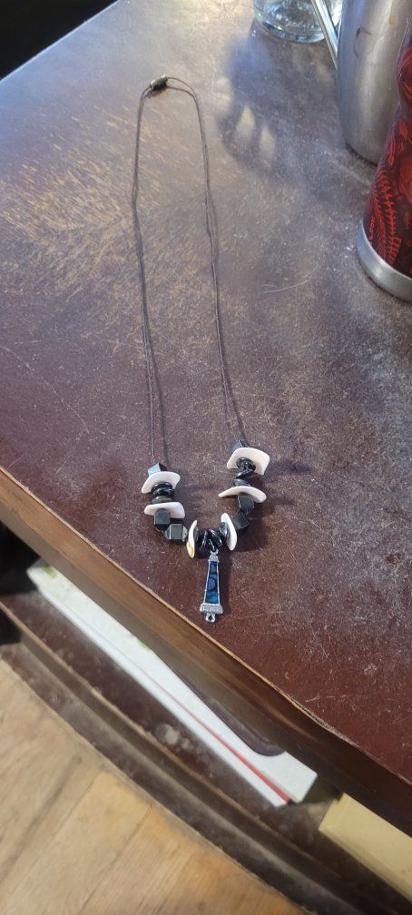 Handmade Lighthouse Charm Necklace with Black & White Beads - on a cord with a barrel clasp .
