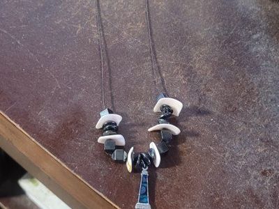 Handmade Lighthouse Charm Necklace with Black & White Beads - on a cord with a barrel clasp .