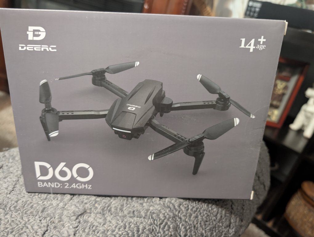 NEW with seal DEERC D60 drone, located in Roy