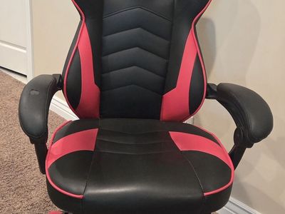Black and Red Gaming Chair with Footrest and Lumbar Pillow