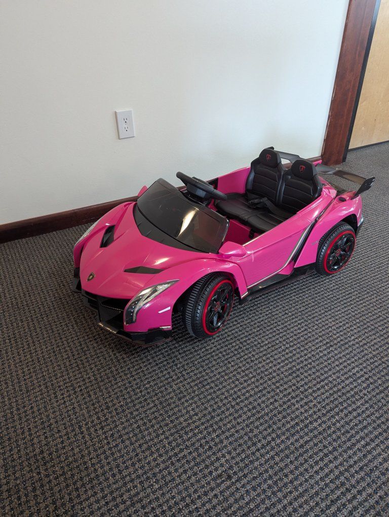 barely used pink ride on Lamborghini kids toy