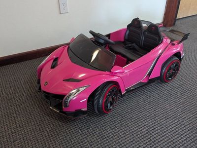 barely used pink ride on Lamborghini kids toy