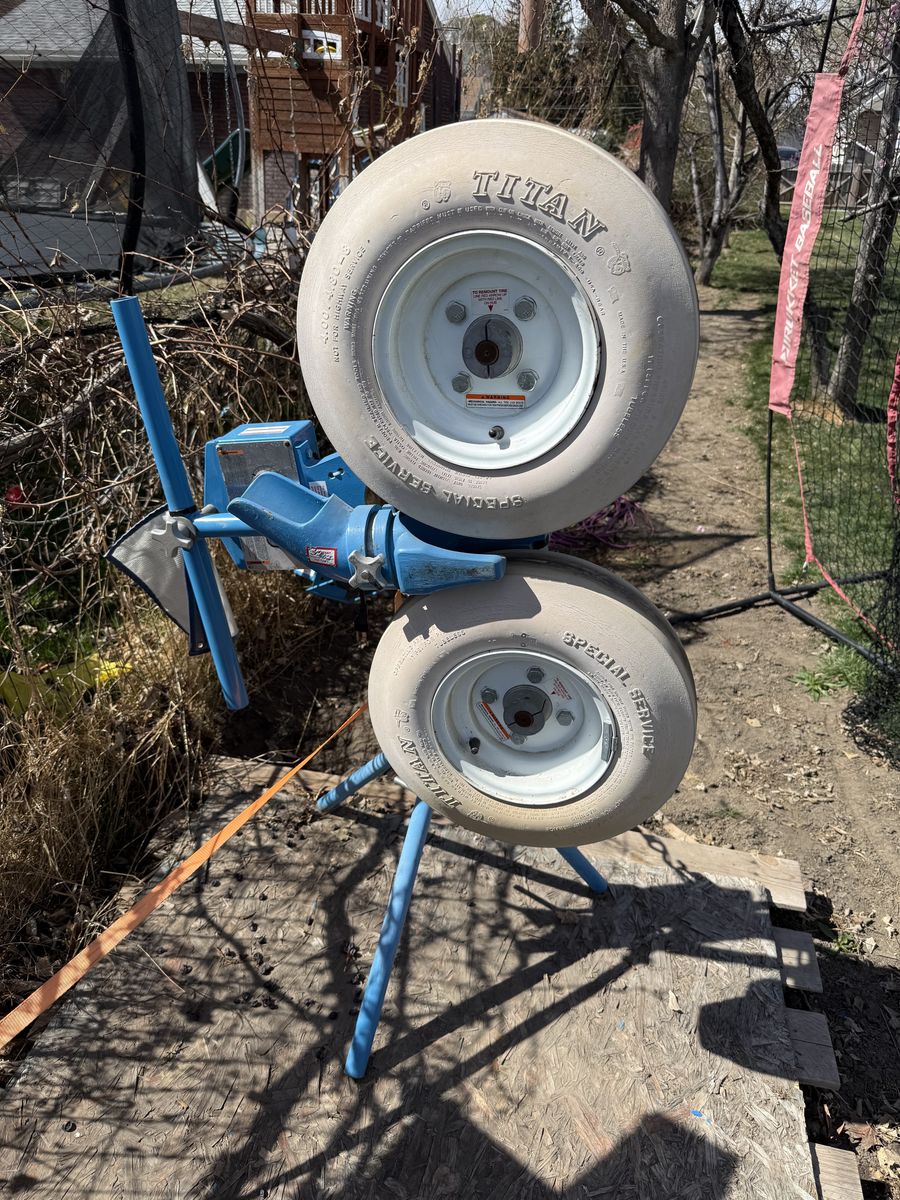 Dual-Wheel Pitching Machine + Batting Cage