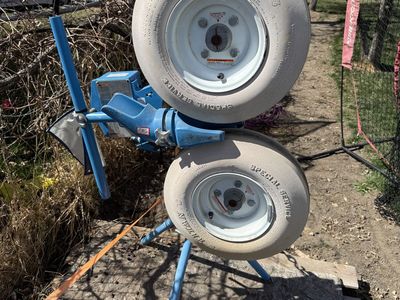 Dual-Wheel Pitching Machine + Batting Cage