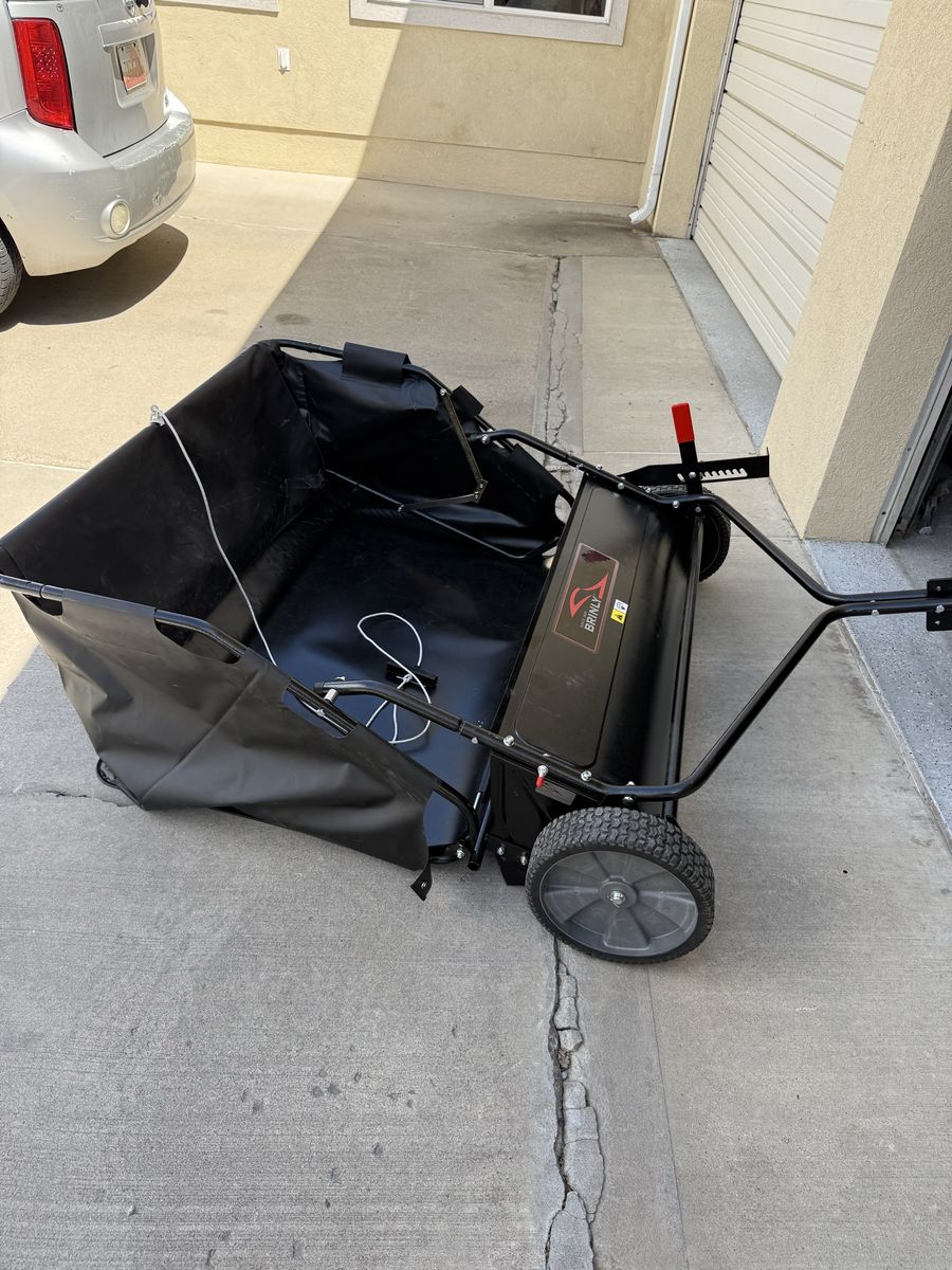 42 inch wide Brinly Lawn Sweeper