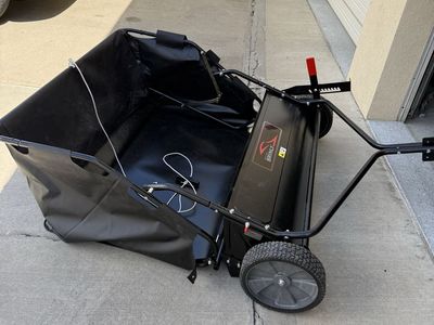 42 inch wide Brinly Lawn Sweeper