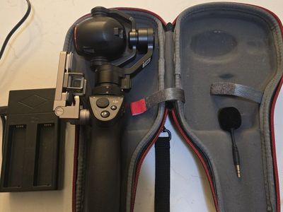 DJI Osmo Handheld Gimbal with a Zenmuse X3 Camera, featuring a 4K camera mounted on a 3-axis stabil