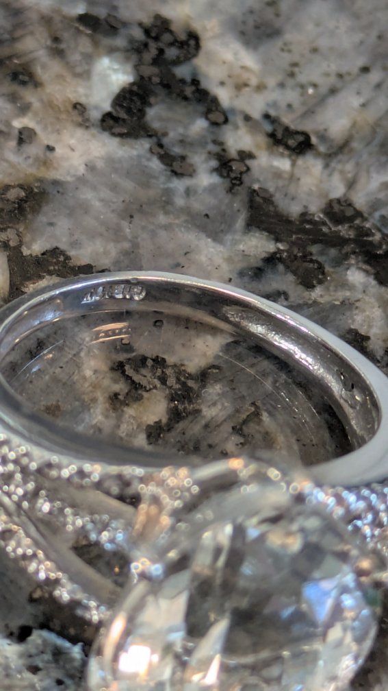 10 karat white gold Ring with 11.5 carat natural topaz stone. big rock