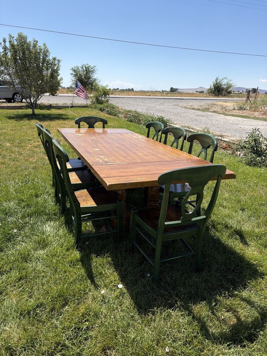 Large Dining Table, 8 sturdy chairs.