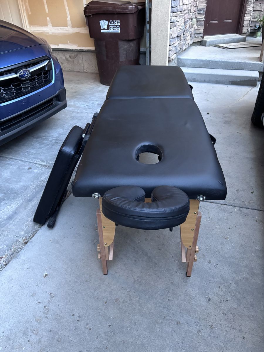 Portable Black Massage Table with Adjustable Headrest and Side Armrests