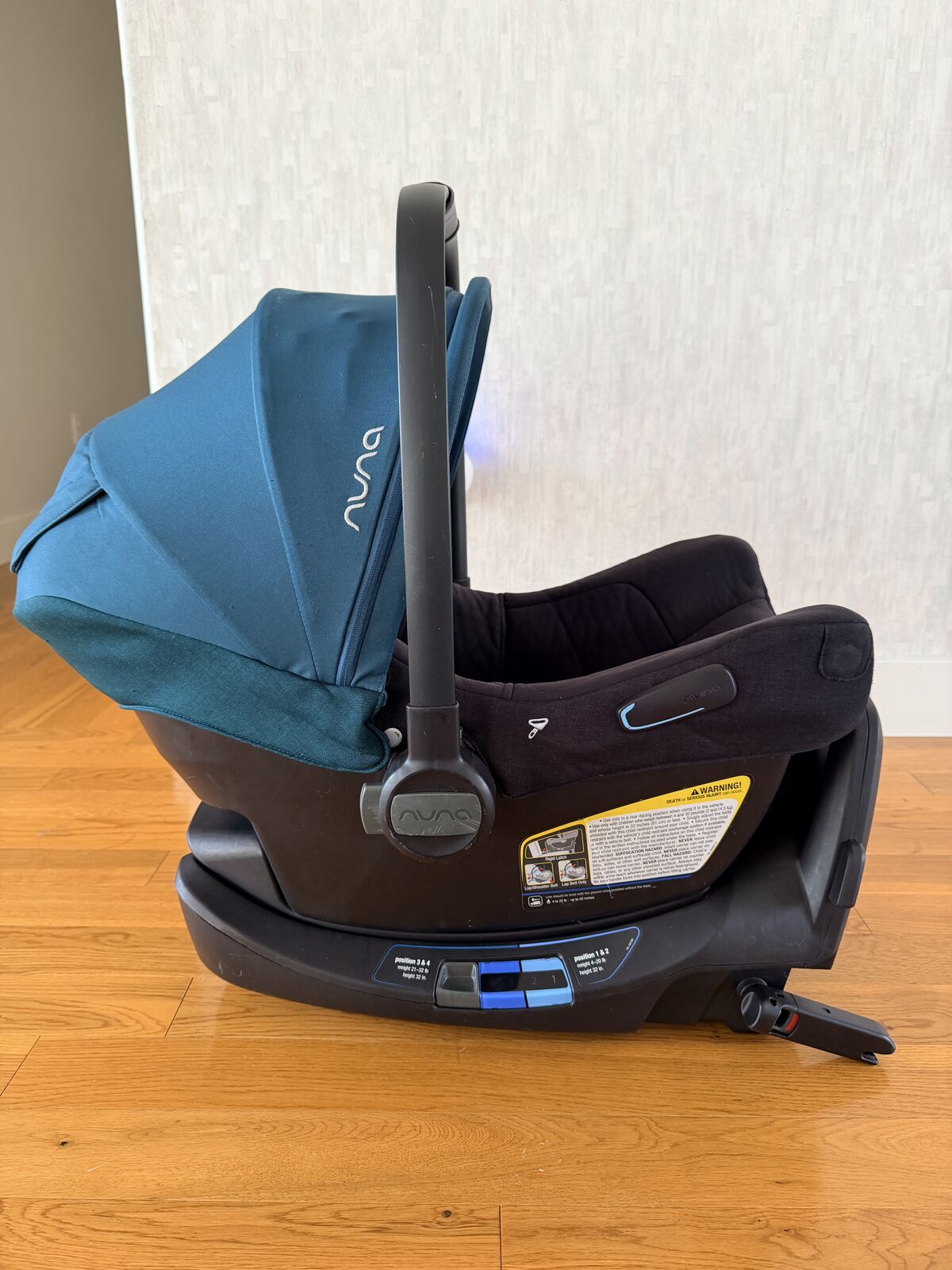 Nuna PIPA Infant Car Seat with Base color Lagoon