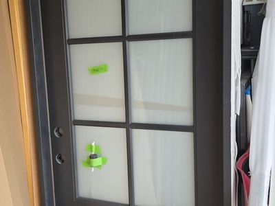 New front door beautiful black! Privacy glass, back, patio, garage door. Exterior interior