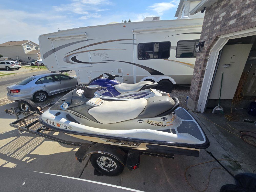 Pair of Personal Watercraft with Double Trailer - Yamaha GP1200R 2 seat & Kawasaki 1100 STX DI 3 seat with trailer