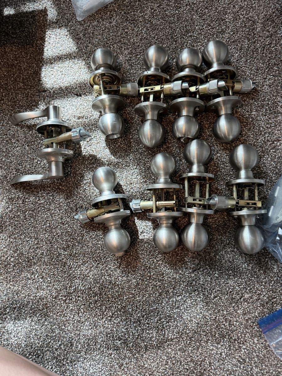 9 door knobs - brushed nickel