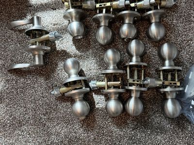 9 door knobs - brushed nickel