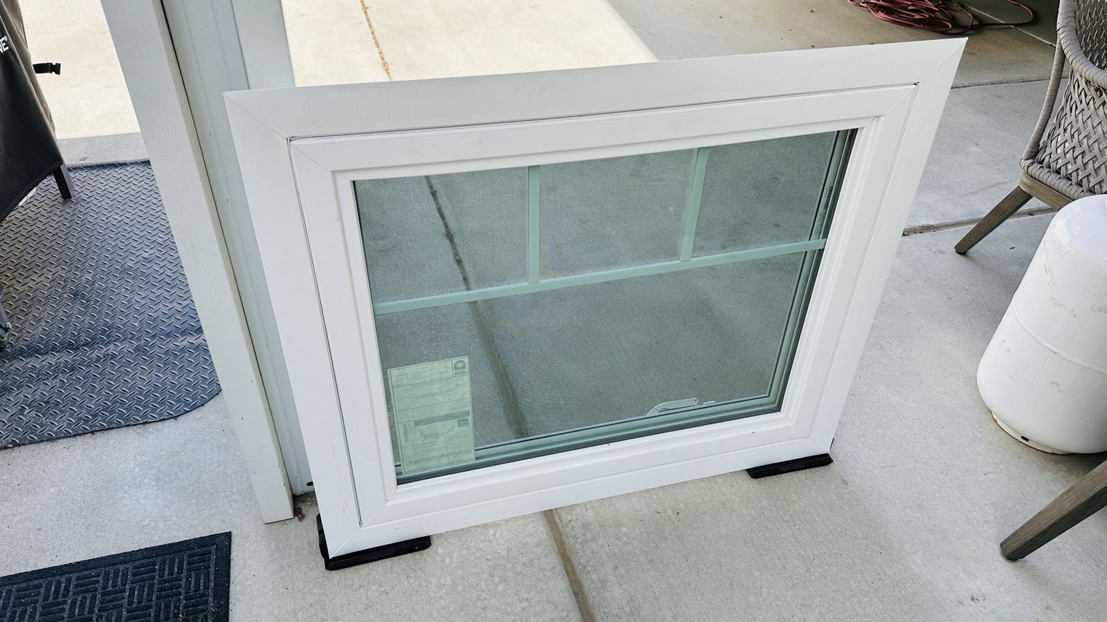 White Vinyl Casement Window with Grids and Screen