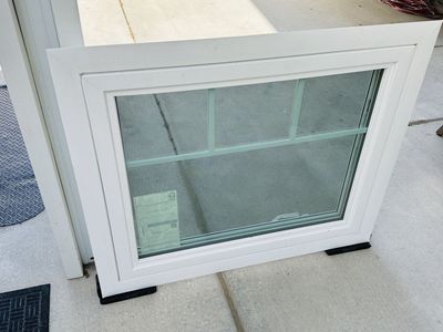 White Vinyl Casement Window with Grids and Screen