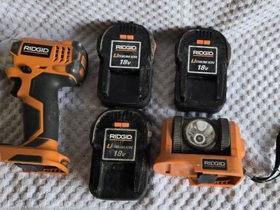 RIDGID 18V Cordless Power Tool Set with Impact Driver Light and 3 Batteries