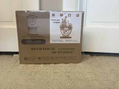 3D puzzle of father and daughter