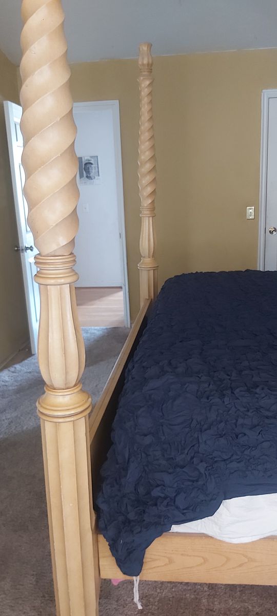King-size poster bed heavy wood