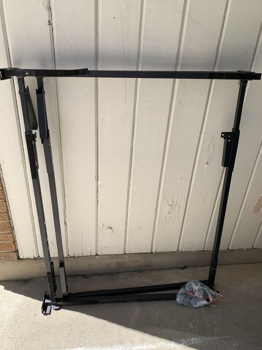 Bed frame adjustable for twin or queen