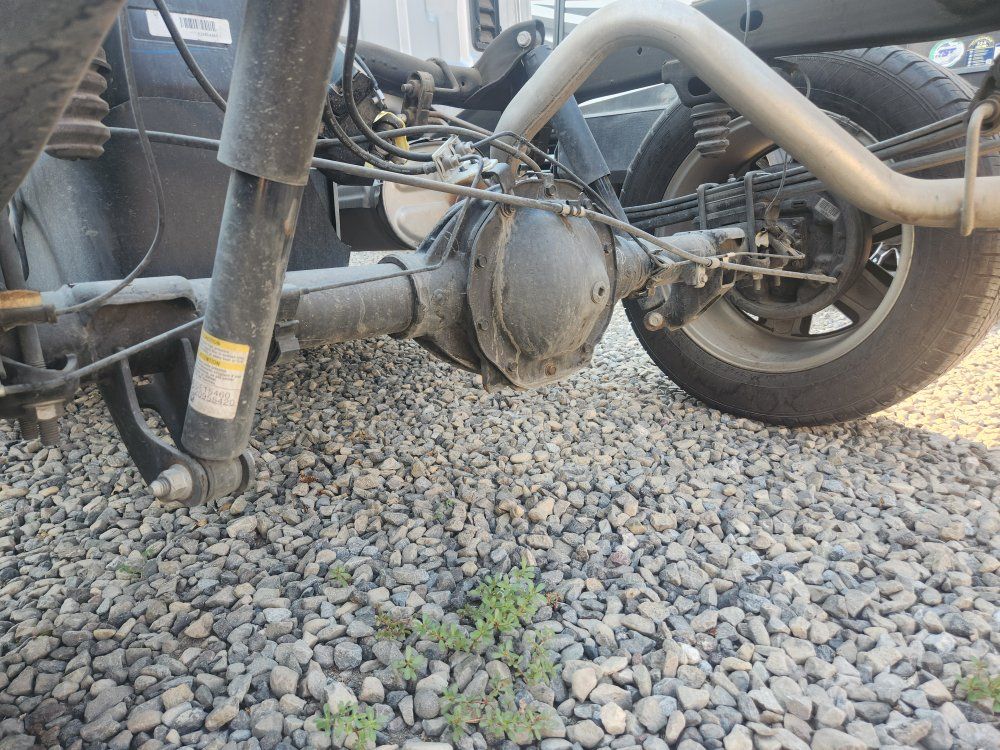 2013 GMC SIERRA Truck Rear Axle Assembly with Differential Housing and Suspension Components. 3.08 gears with 8.6 ring gears.