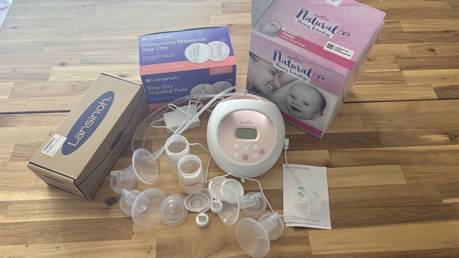 Spectra Breast Pump. Accessories, milk, storage bags, and breast pads.