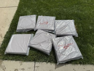 NEW sealed and in package tan outdoor chair cushions (6) zipper off for washing! 15 X 15