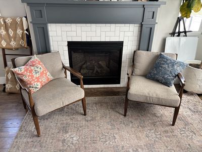 Two chairs grey and brown wood