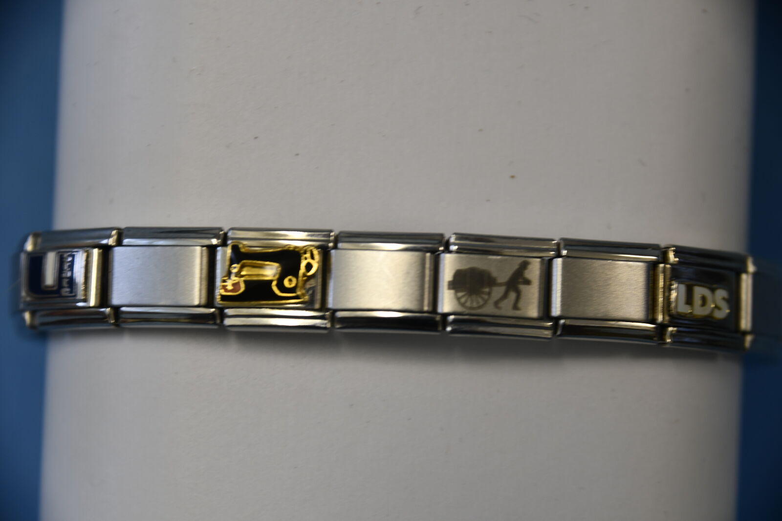 VINTAGE DOLCEORO STAINLESS STEEL CHARM BRACELET with 9 CHARMS ~ 18 LINKS ~ ITALY