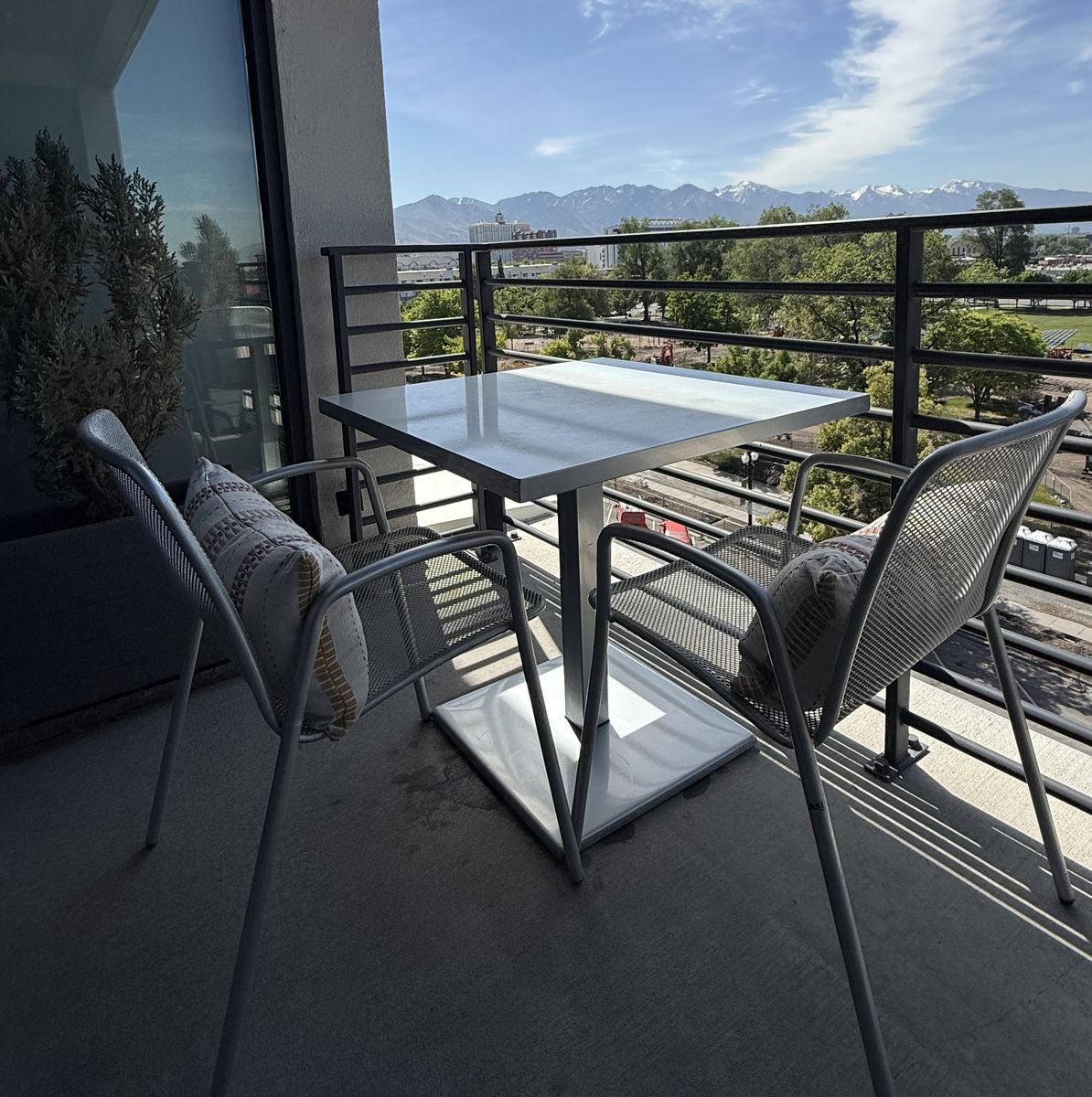 Outdoor metal table and two chairs