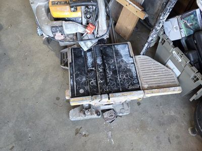DeWalt D24000 wet tile saw features a 10-inch blade and a sliding tray w/ stand works great $150 OBO