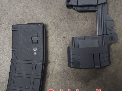 AR-15 magazines (30 rnds) & (60 rnds) with quick loading device