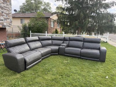 Spacious Gray Reclining Sectional Sofa with Cupholders - Comfort & Style for Your Living Space