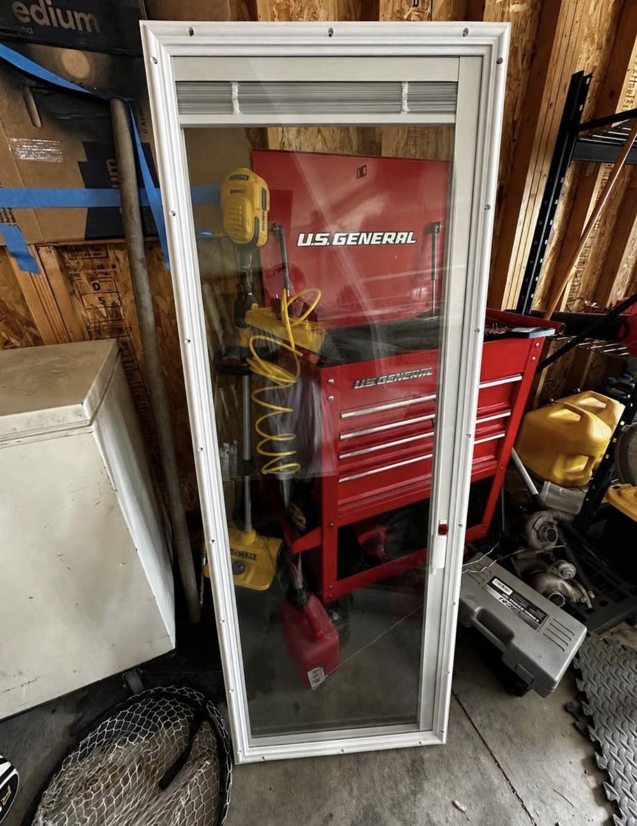 Door glass with blinds  22 inches by 64 inches 