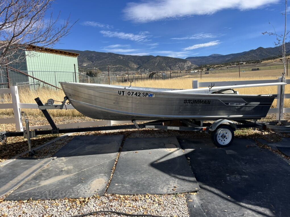14 FT Grumman Aluminum boat And Trailer