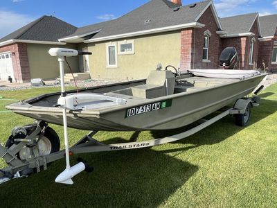 Tracker 1860 Jon Boat with 60 HP Mercury Outboard and Minn Kota Trolling Motor