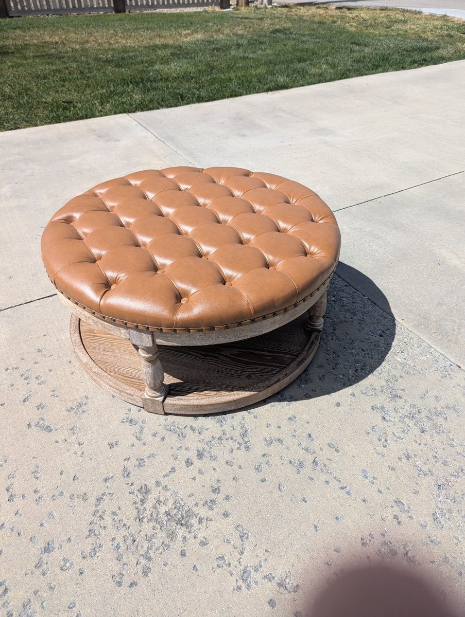 Round Tufted Cognac Ottoman with Lower Shelf – New