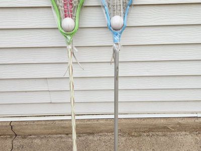 lacrosse stick, brine, green & pink, DeBeers, blue and white, good condition