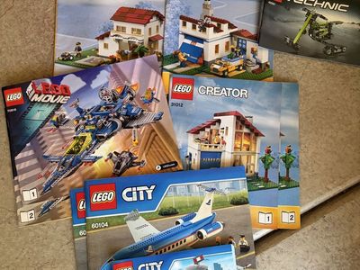Legos - large plastic bins - some set instructions