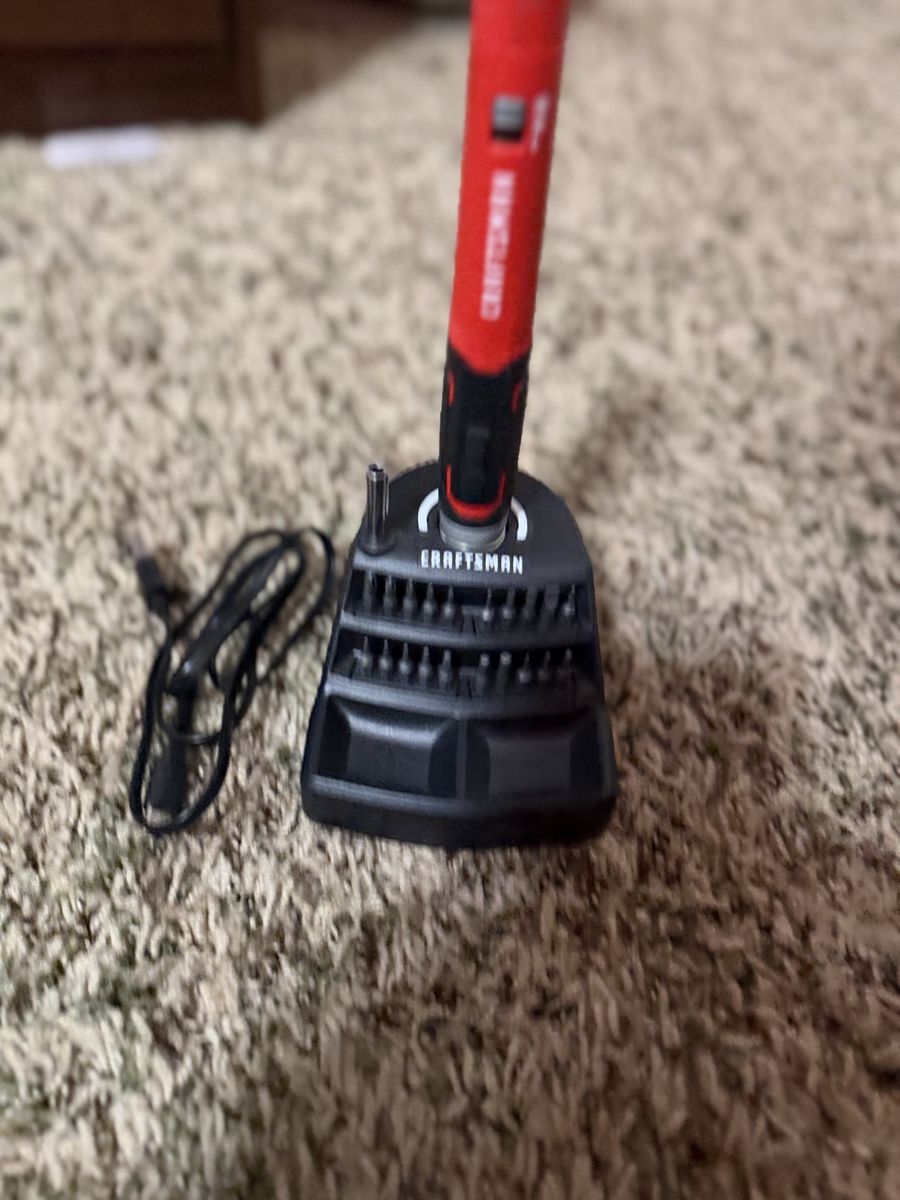 Brand new Craftsman electric precision screwdriver set with docking station.