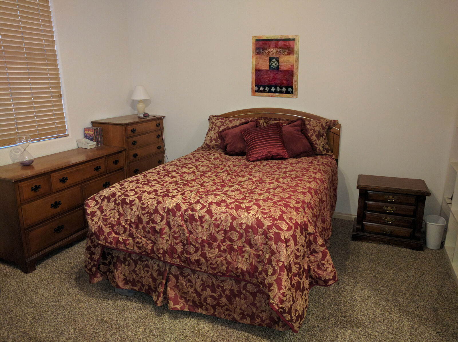 Red & gold bedspread, bed skirt, and shams. Queen size.