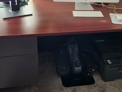 Desk, office chair, monitor, keyboard and speaker