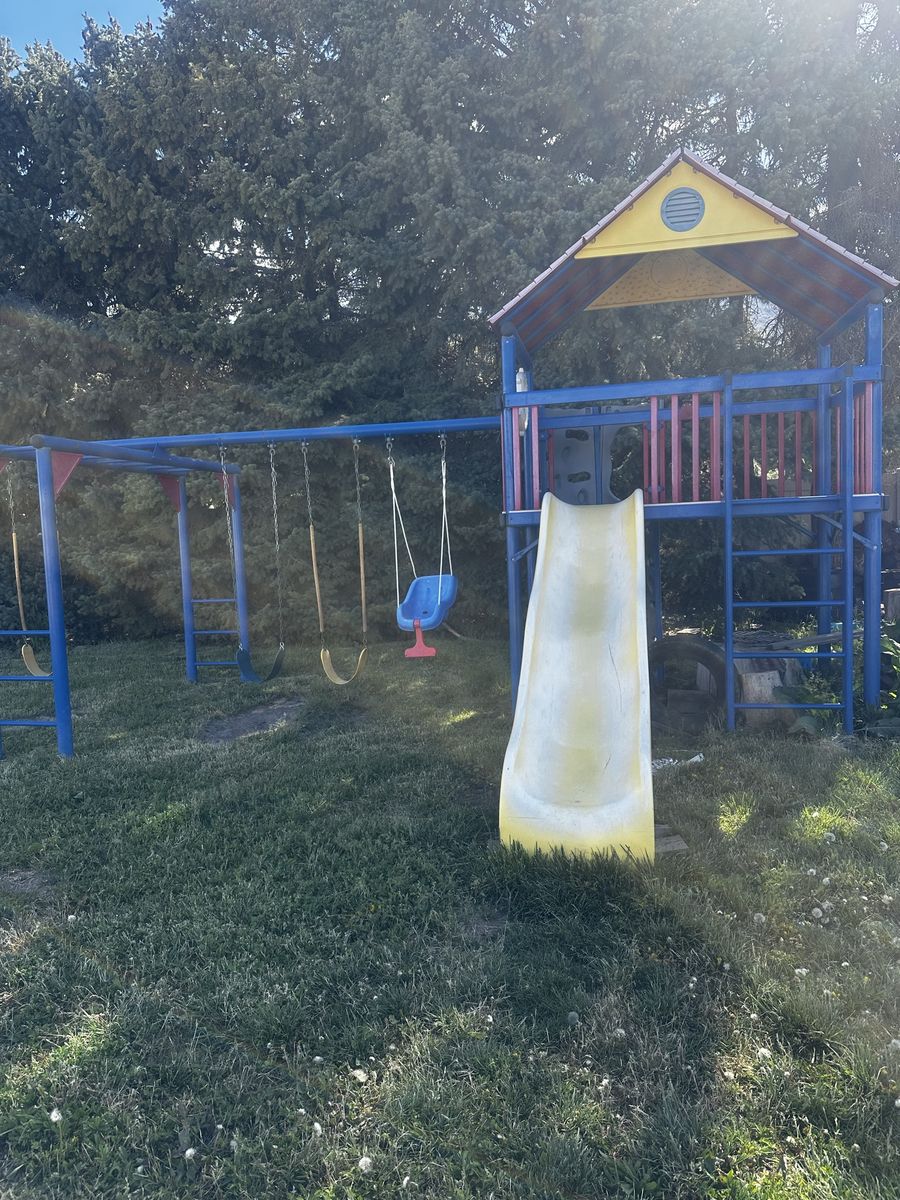 Massive commercial grade play set with monkey bars and slide