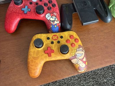 Nintendo Switch Pro Controllers - Mario & Donkey Kong Editions + Joy-Con Grip & 5 Games