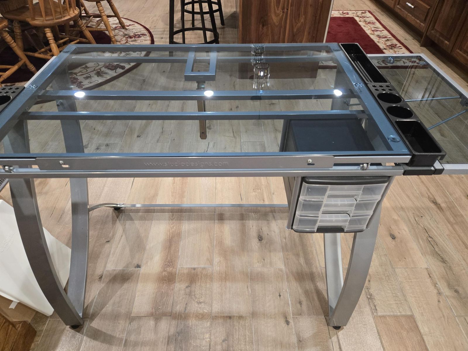 Studio Designs Futura Art Desk, Craft Station, Drafting Table with Glass Top, 3 Drawers & Side Trays, Silver/Clear